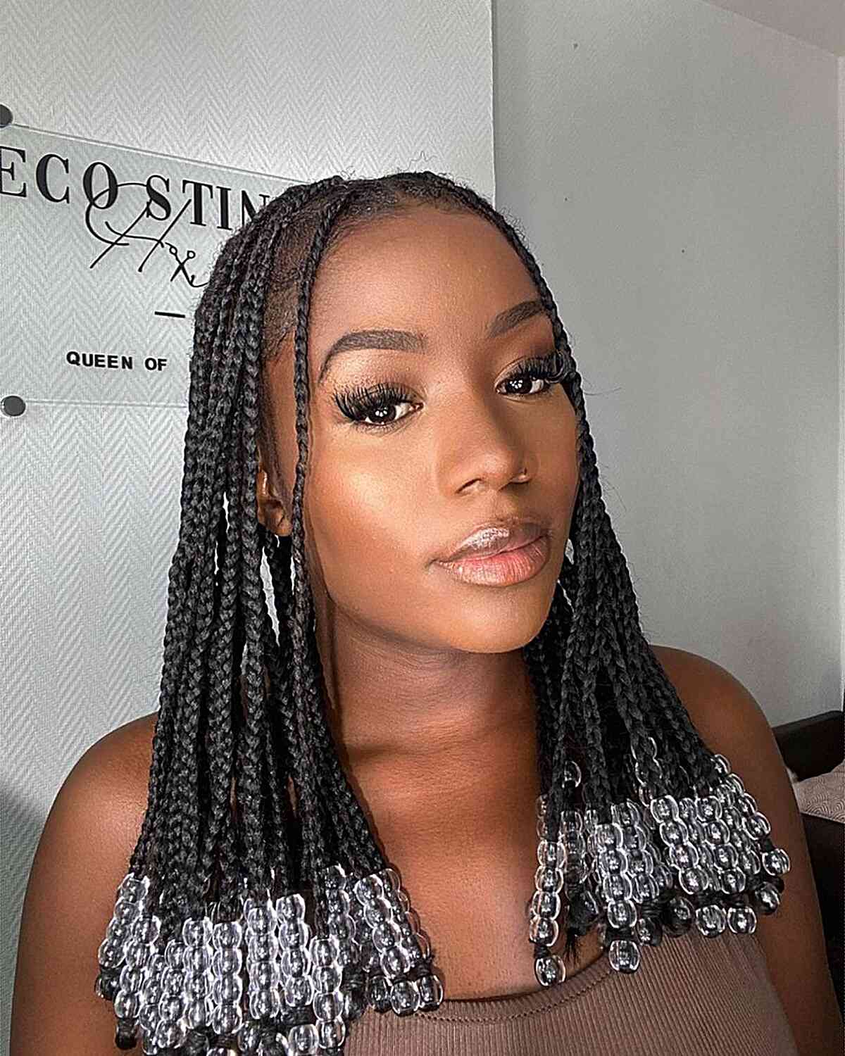 Center-Parted Beaded Knotless Box Braids for Black Girls' Mid-Length Hair