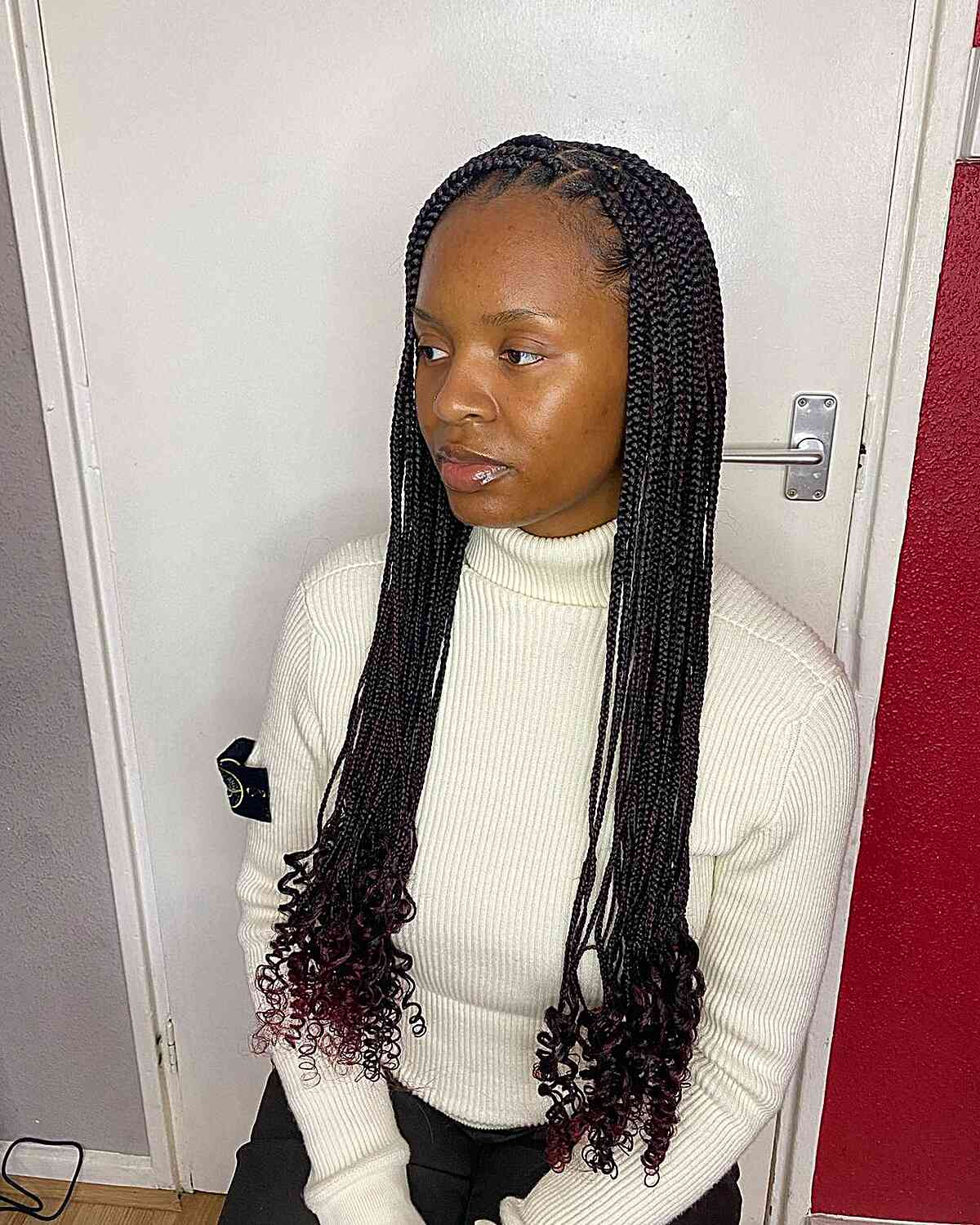 Long long small braids with soft red tips