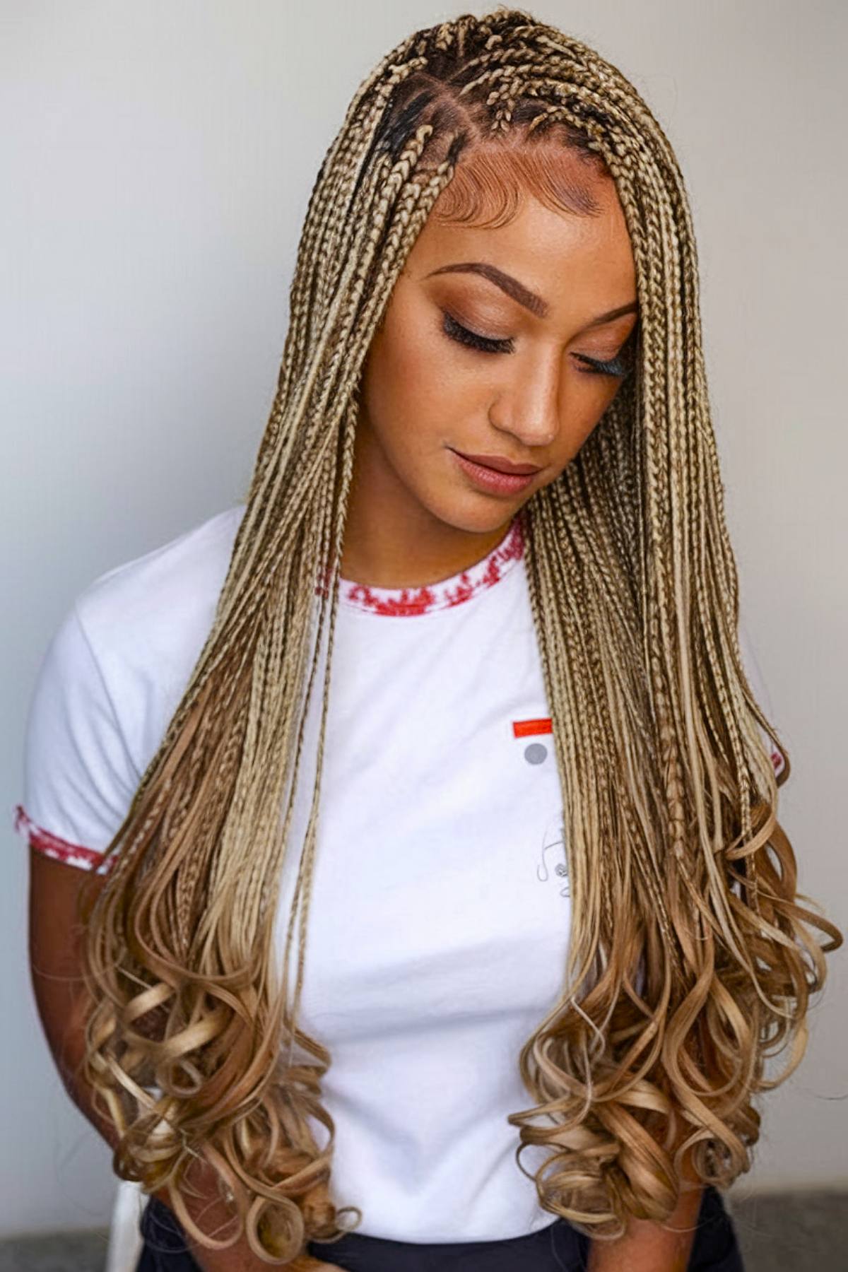 Light blond square braids with soft French curls