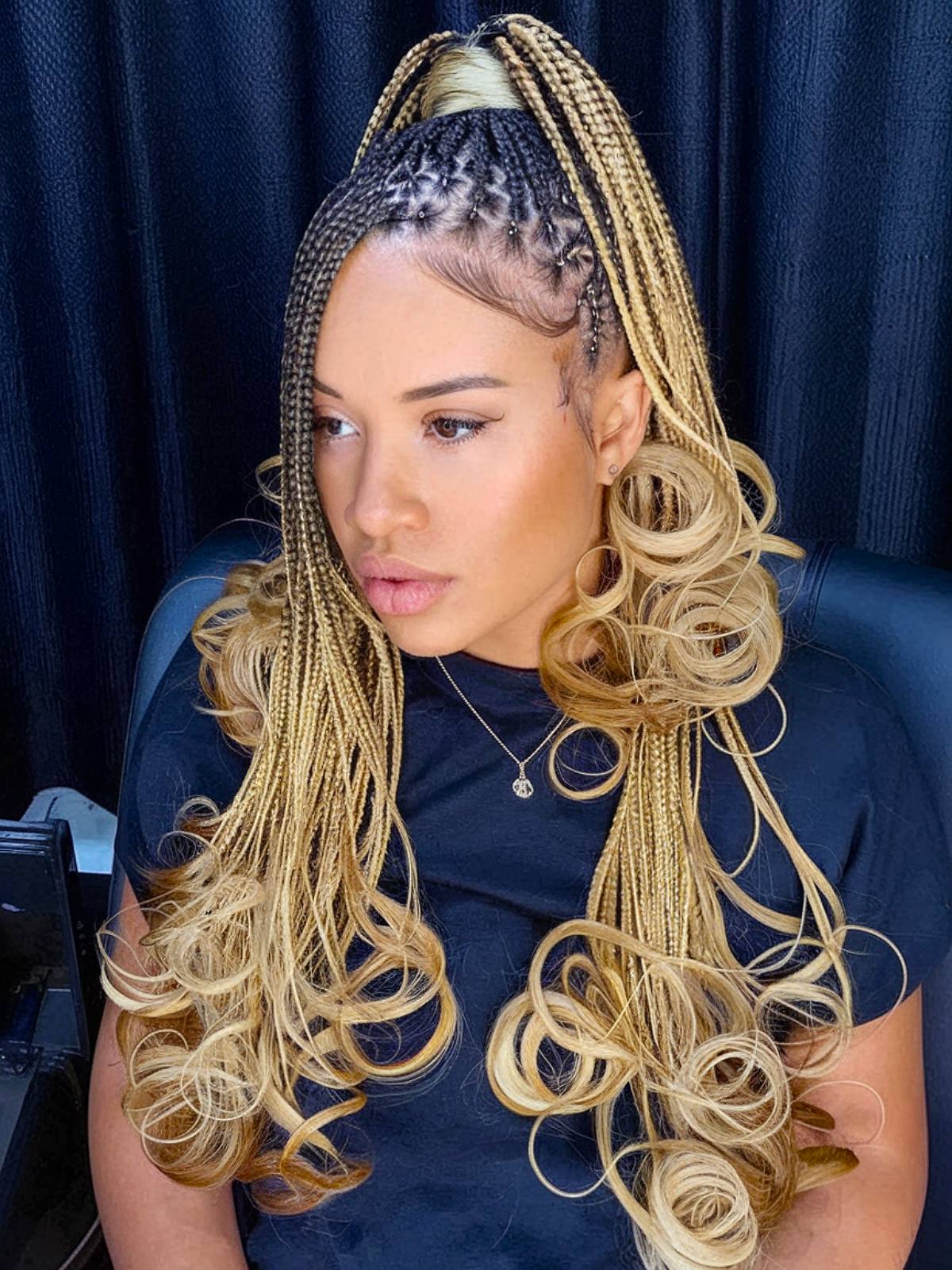 High horse tail with blonde French curls and narrow braids