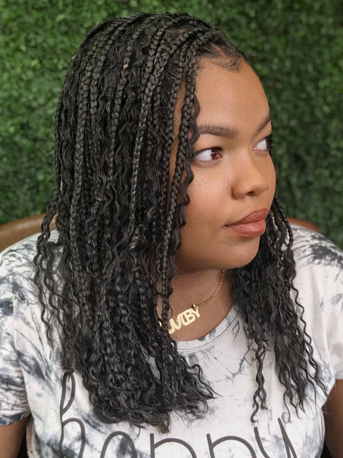 Braids with a length of shoulder with a rich French curl