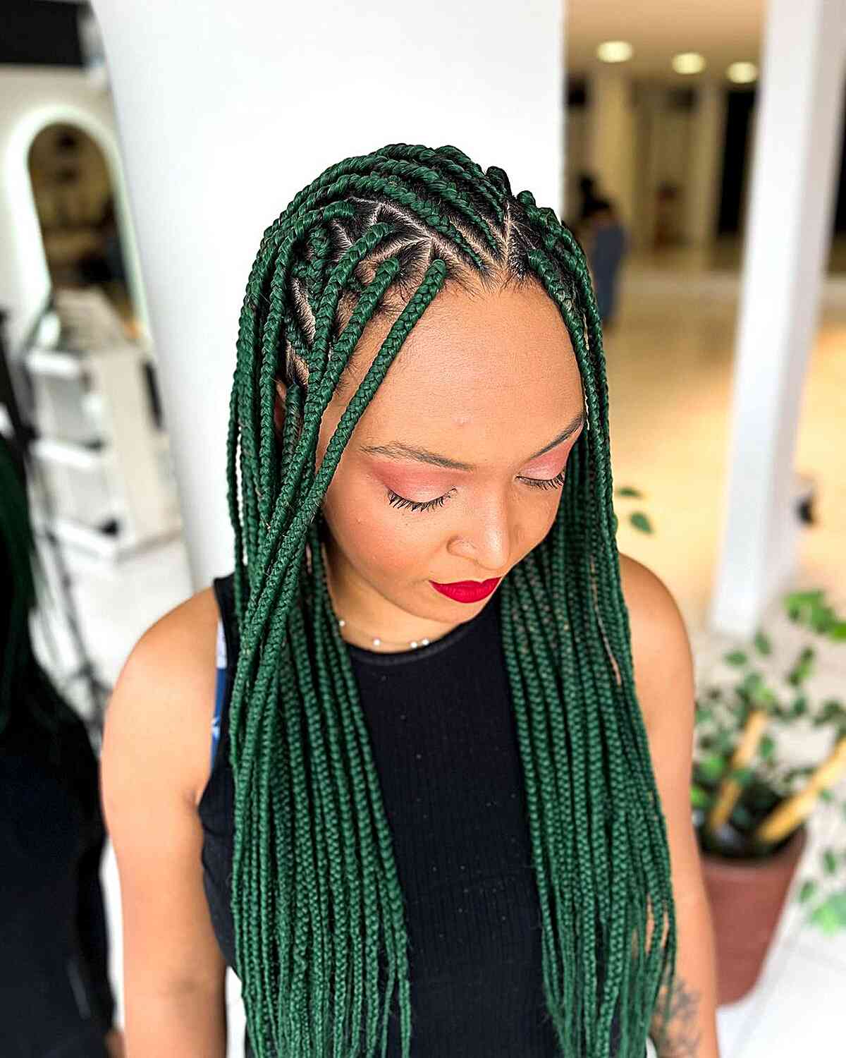 Turn over the braids of the triangle box Fulani