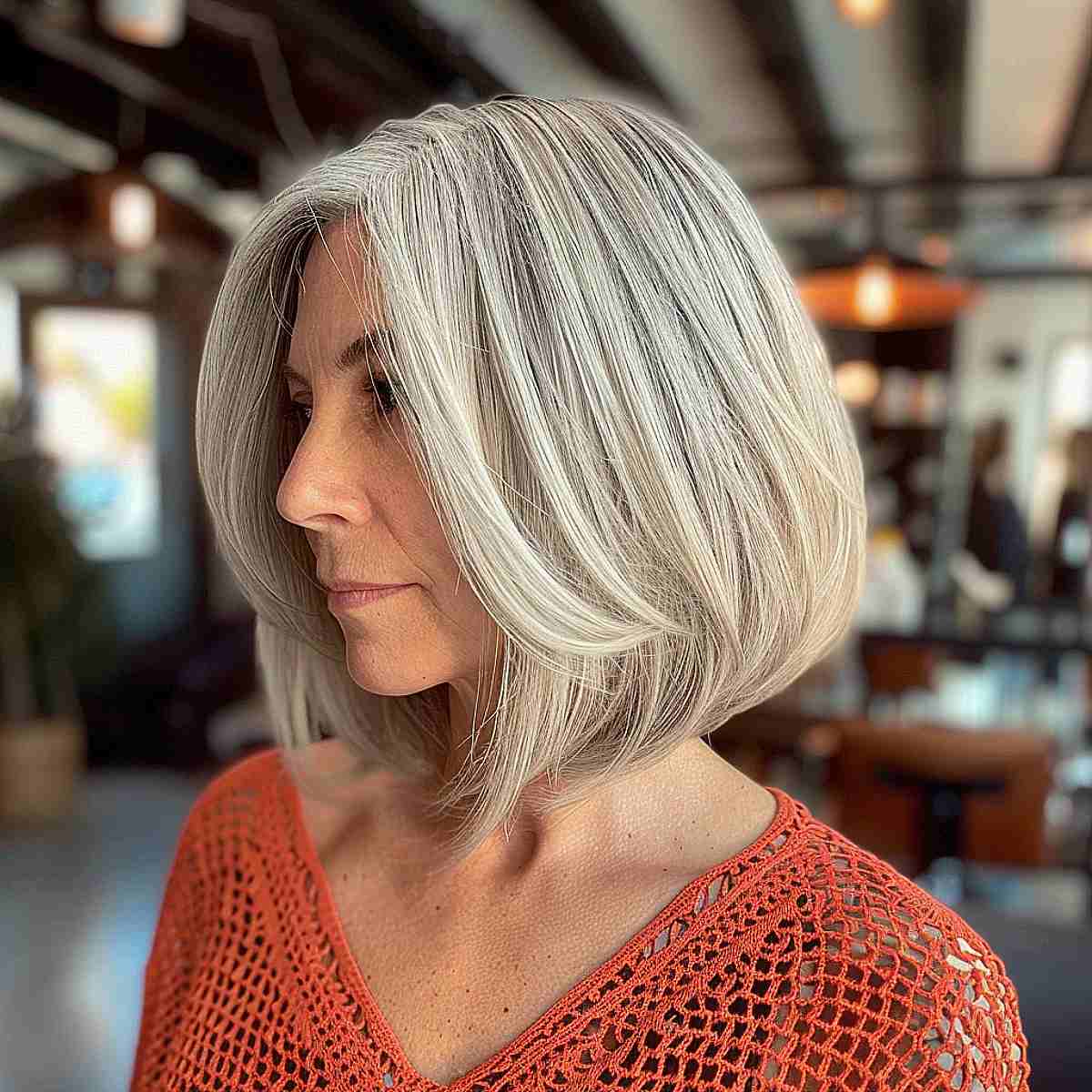 Graduated bob for women over 60 with salt-and-pepper hair
