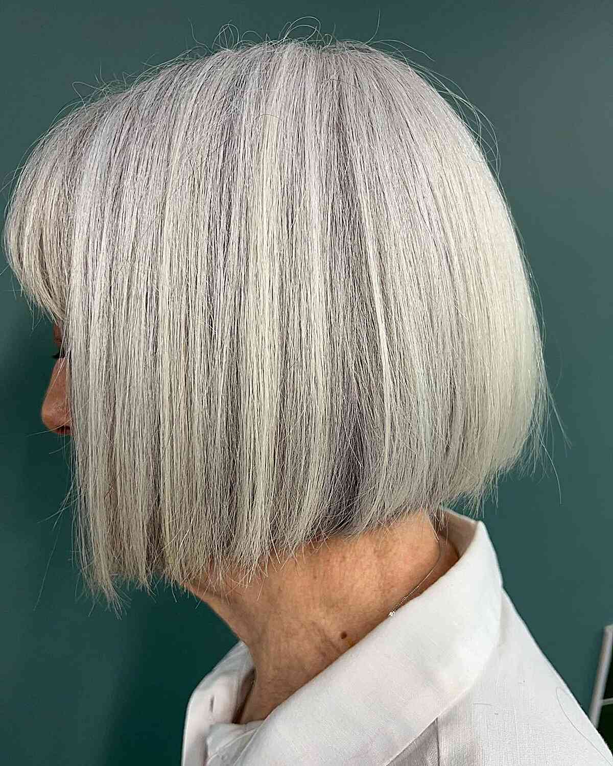 Low-Maintenance Chin-Length Bob on Natural Gray Hair for Woman Over 60