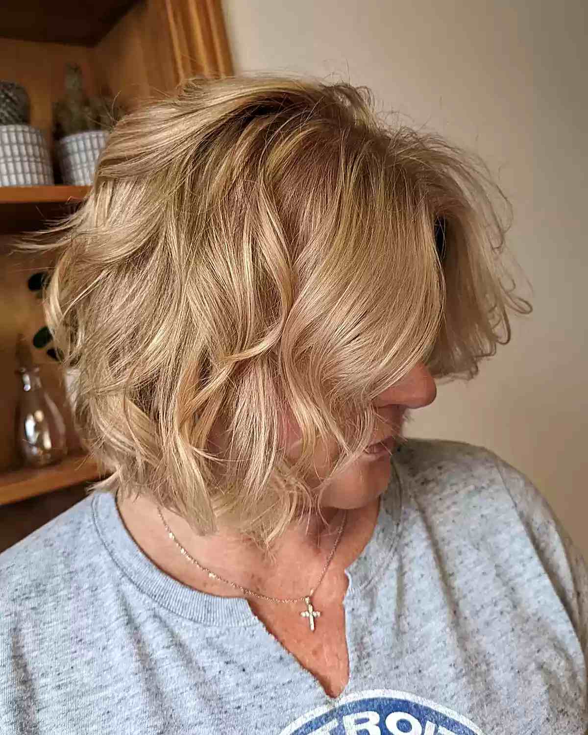 Chin-Length Layered Wavy Bob for Women Aged Sixty