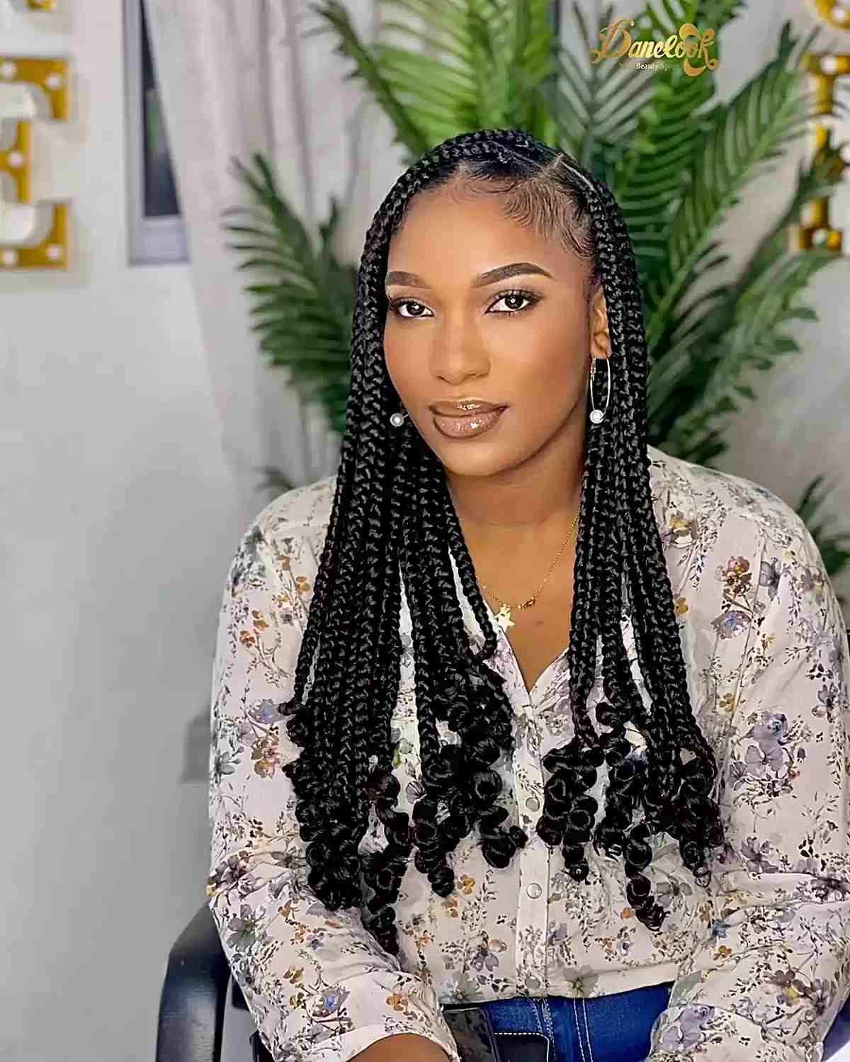 Lengthy Knotless Black Box Braids with Deep Side Part and Curled Ends