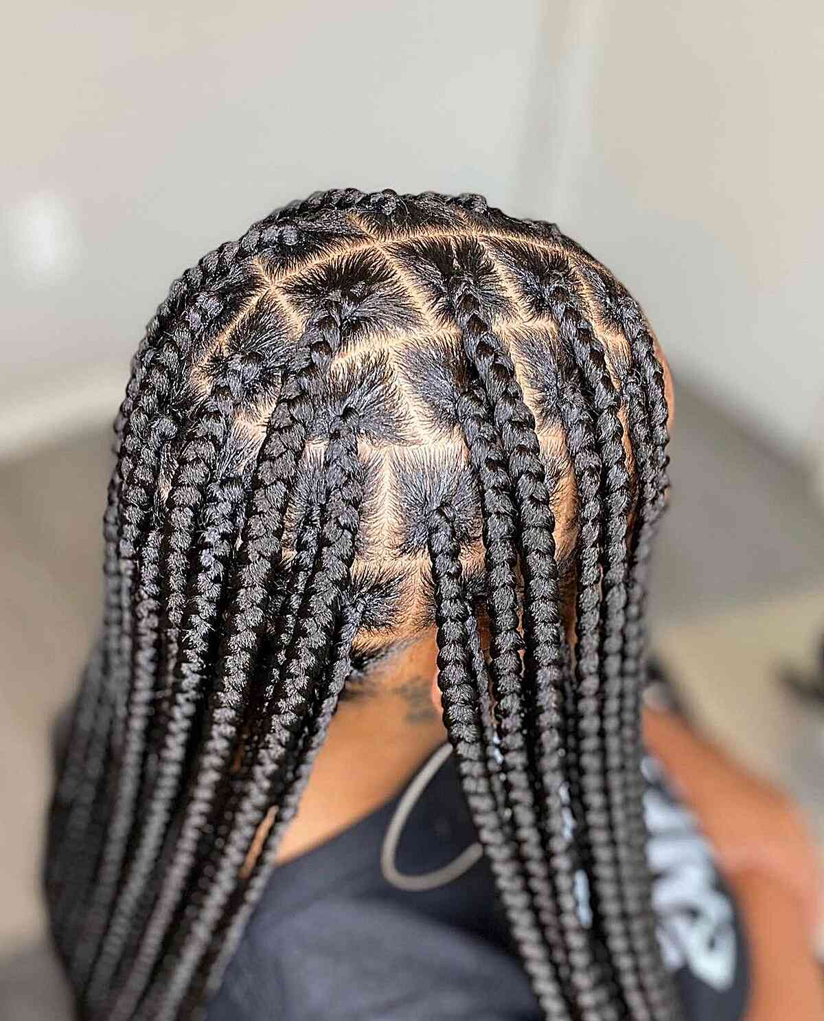 Very Long Neat Knotless Parted Braids on Dark Hair