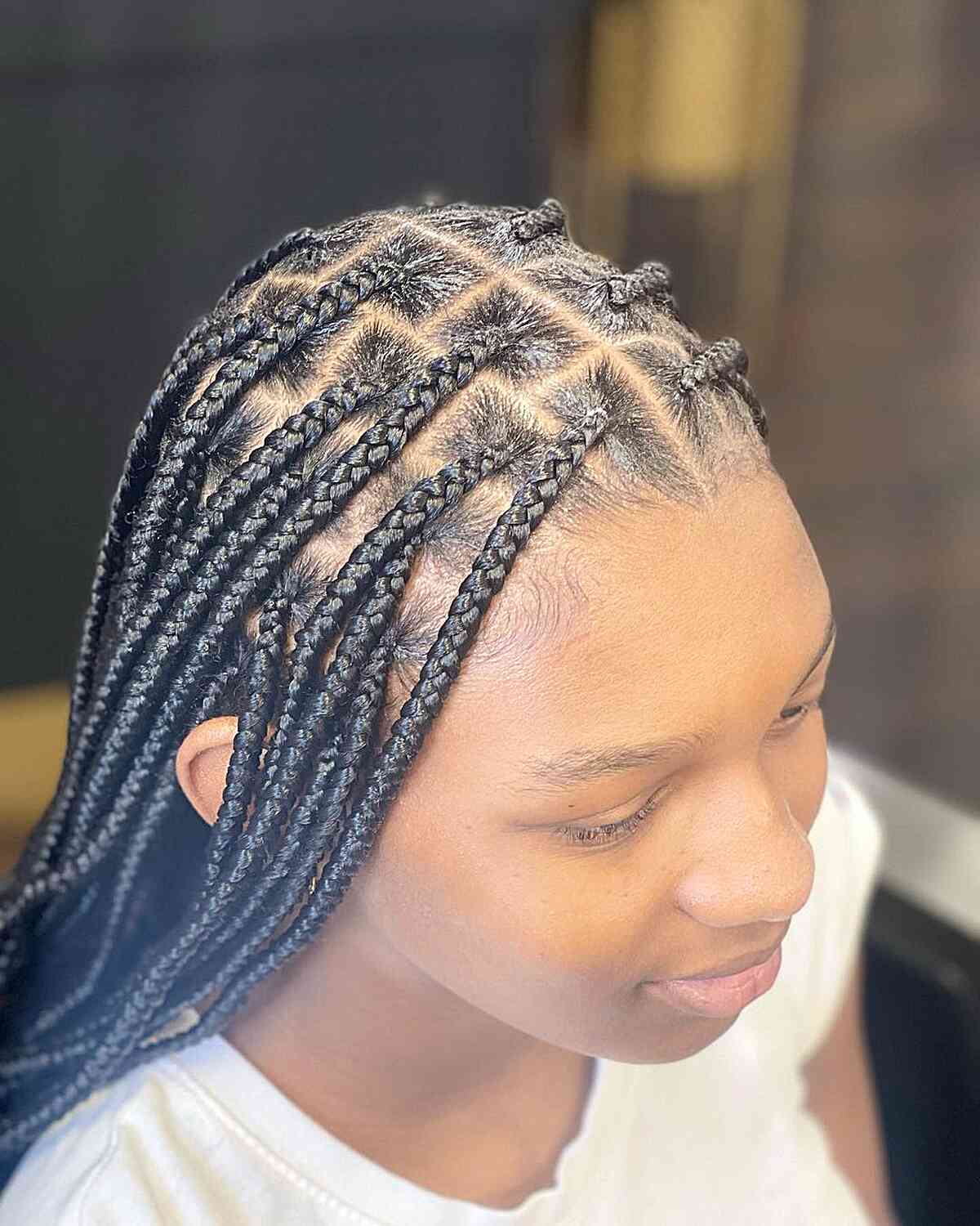 Long-Length Mini Knotless Box Braid Style with Center Part