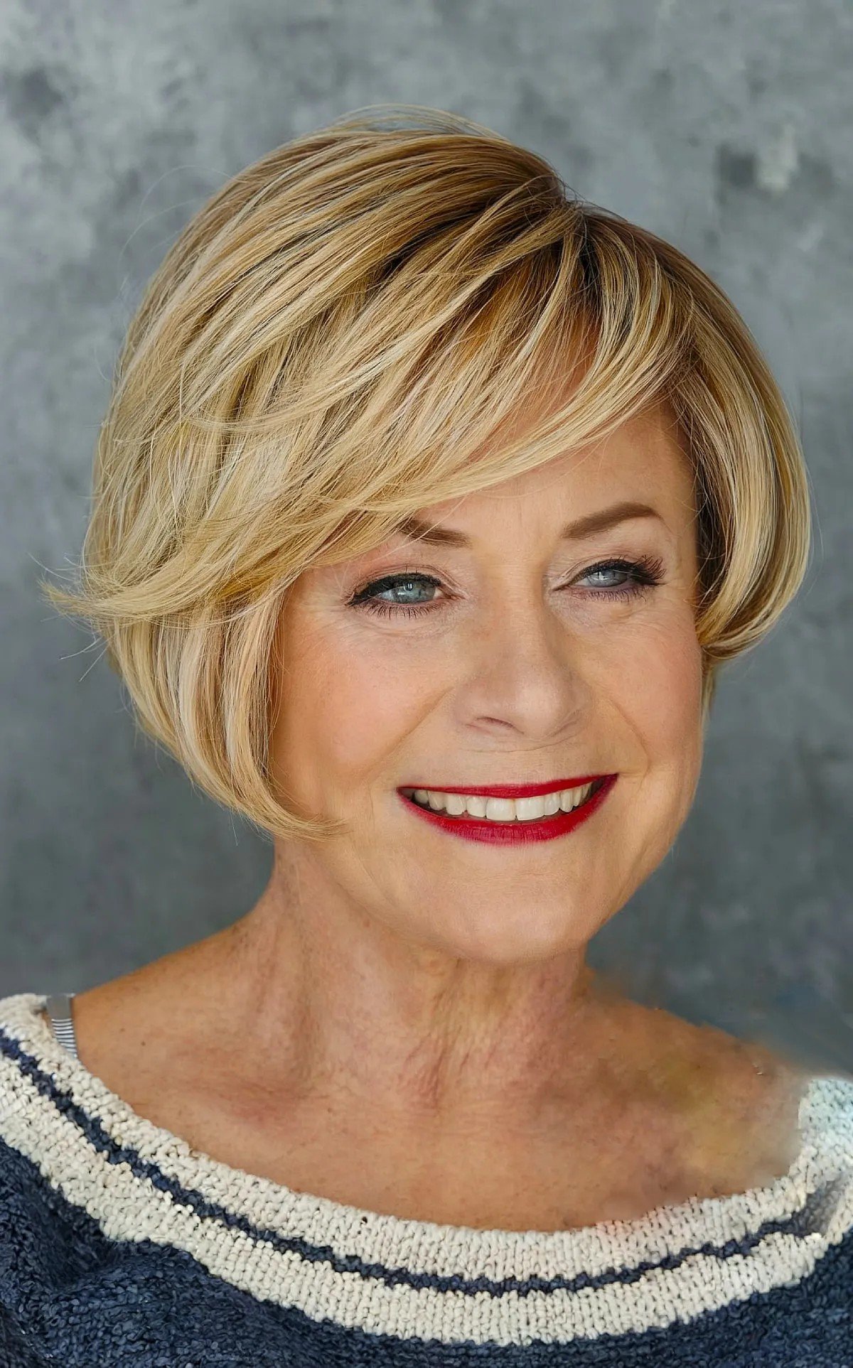 Sweeping Fringe on a Short Blonde Bob Cut for Women Aged 60