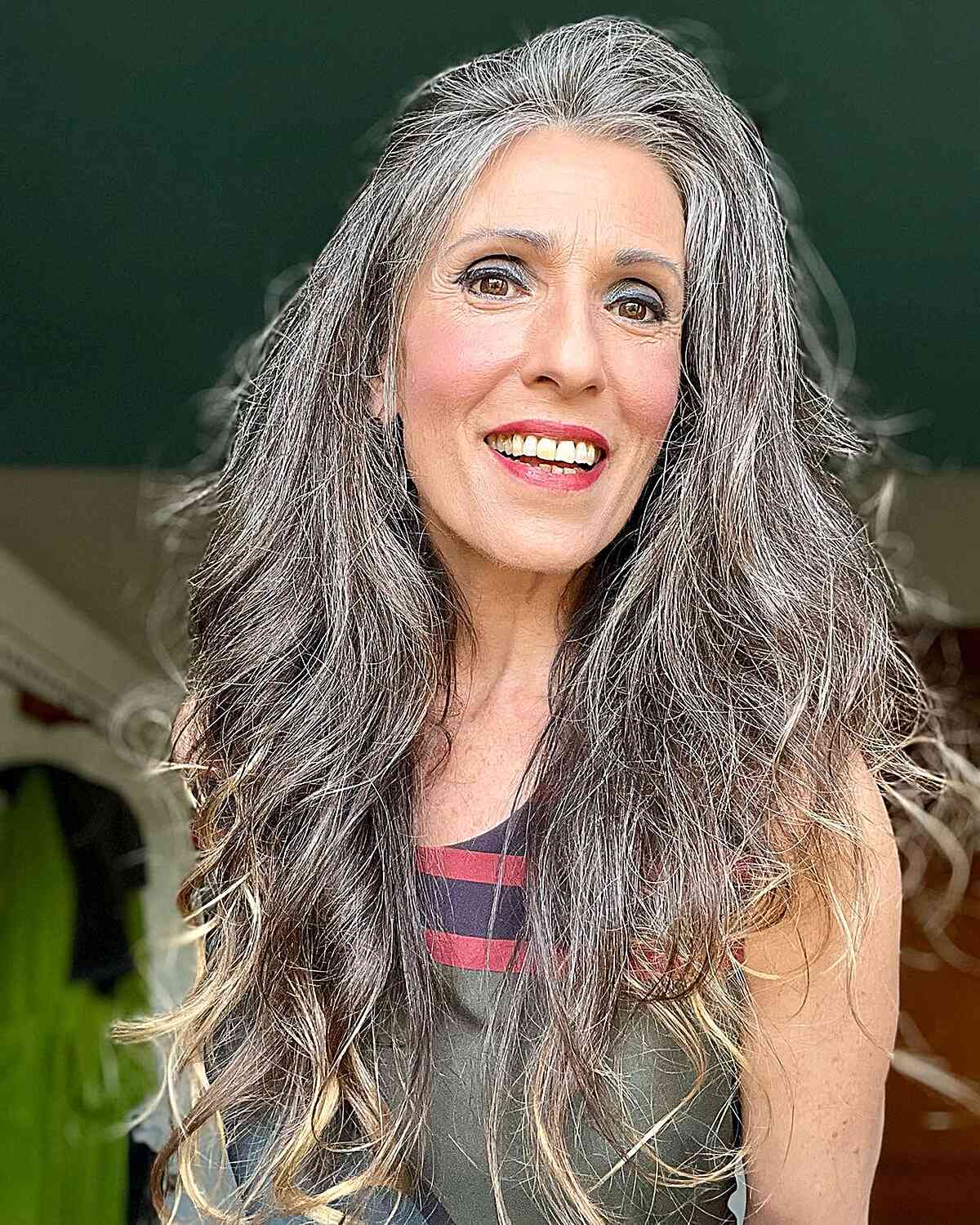 Voluminous Textured Long Hair with Blonde Tips for Older Women Over 60 with Dense Hair