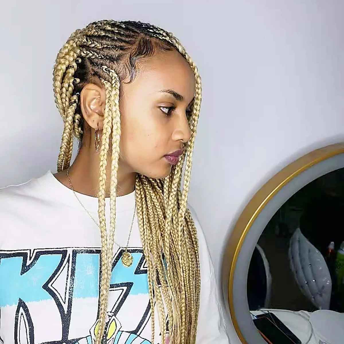 Blonde box braids with the front corn