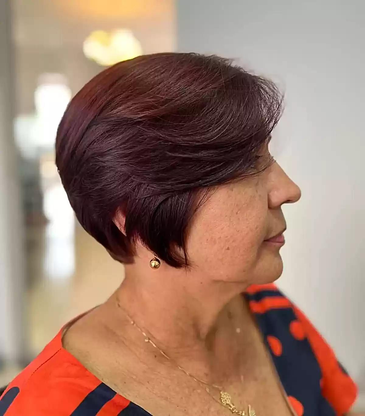 Burgundy Long Pixie Bob Cut on Ladies Aged 70