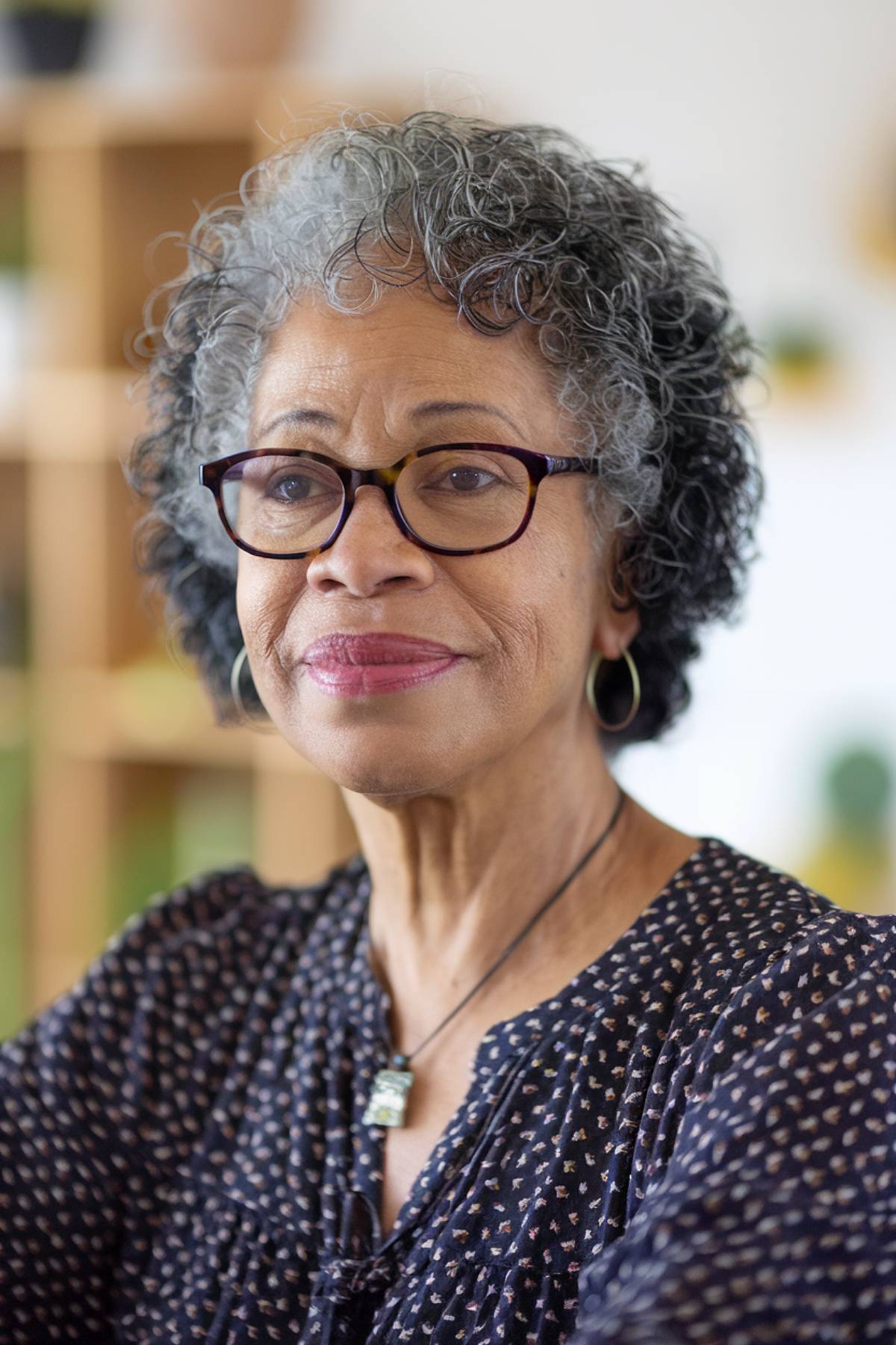 Short hairstyle for black women more than 60 with glasses