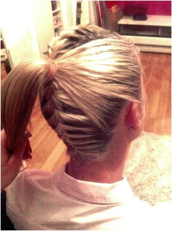 French braid at the back and on top with a ponytail at the back
