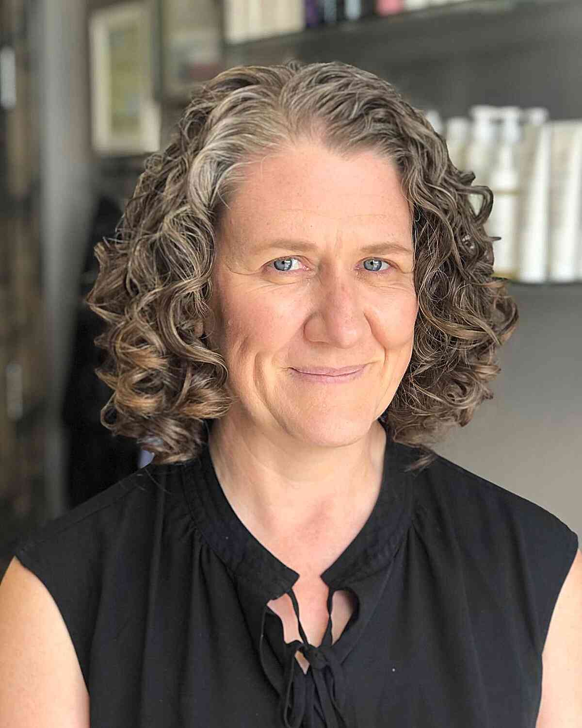 Gray Chin-Length Bob with Curls on Older Women's Oval Faces