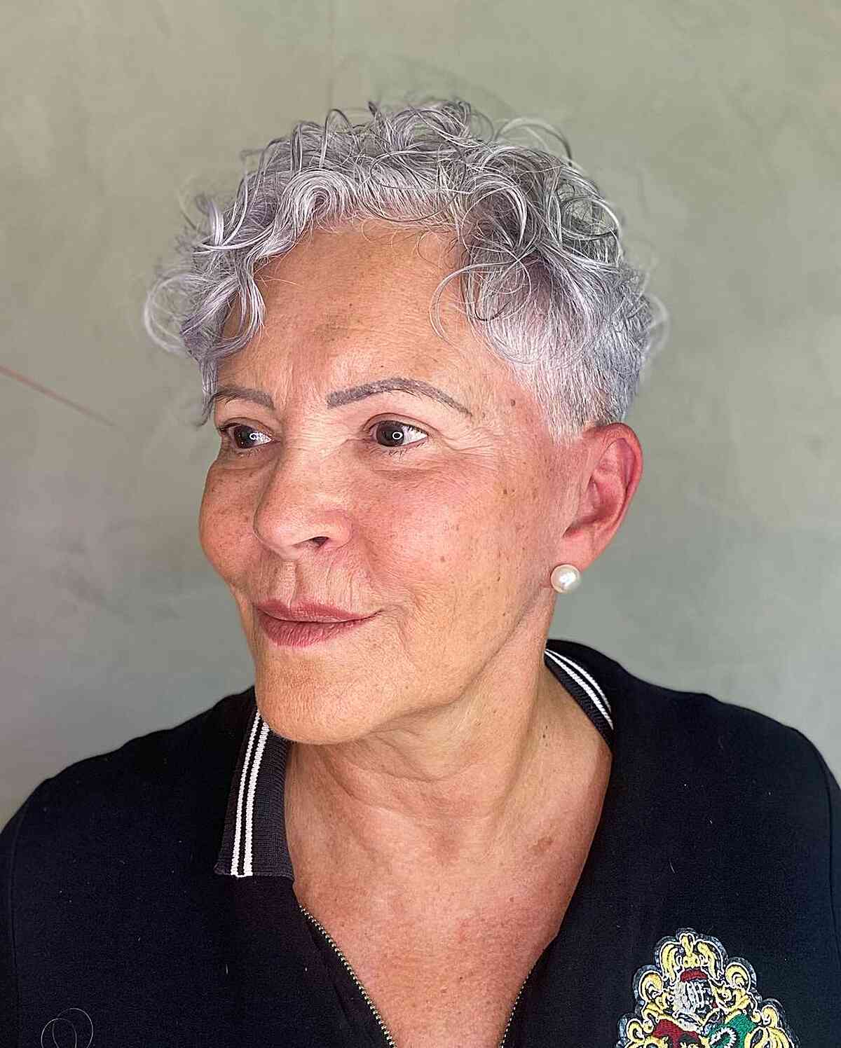 Super Short Cut with Wispy Curls on Senior Ladies with Longer Faces