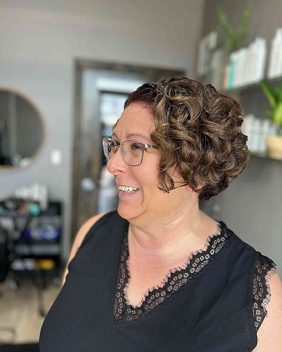 Cheek-Length Cropped Bob with Voluminous Curls for Mature Women