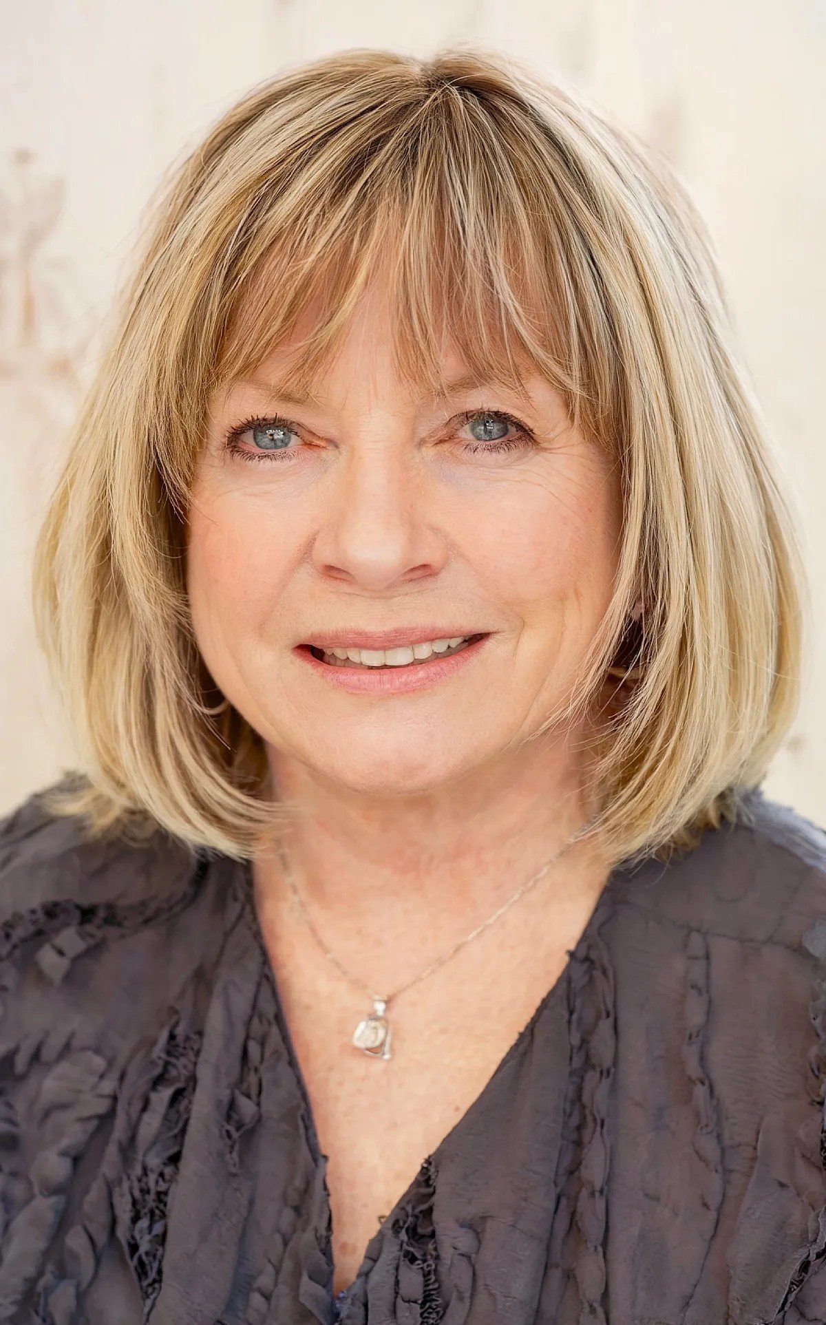 Short Dimensional Thick Bob with Thin Bangs on Women Aged 60+