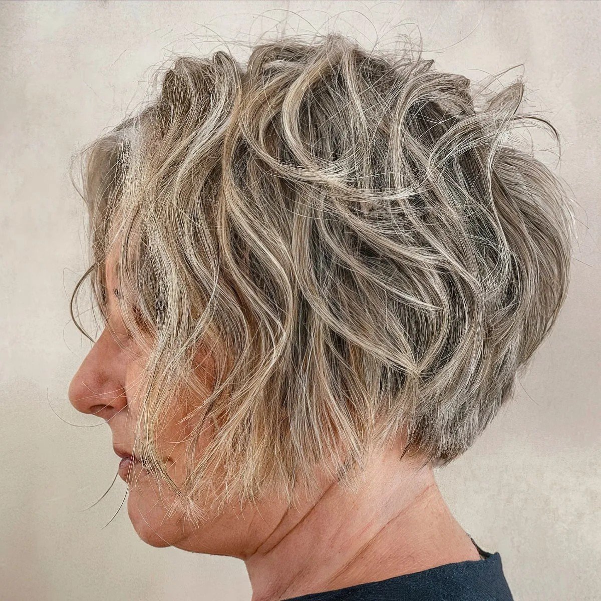 Tousled Layered Hairstyle on Women's Short Silver Hair