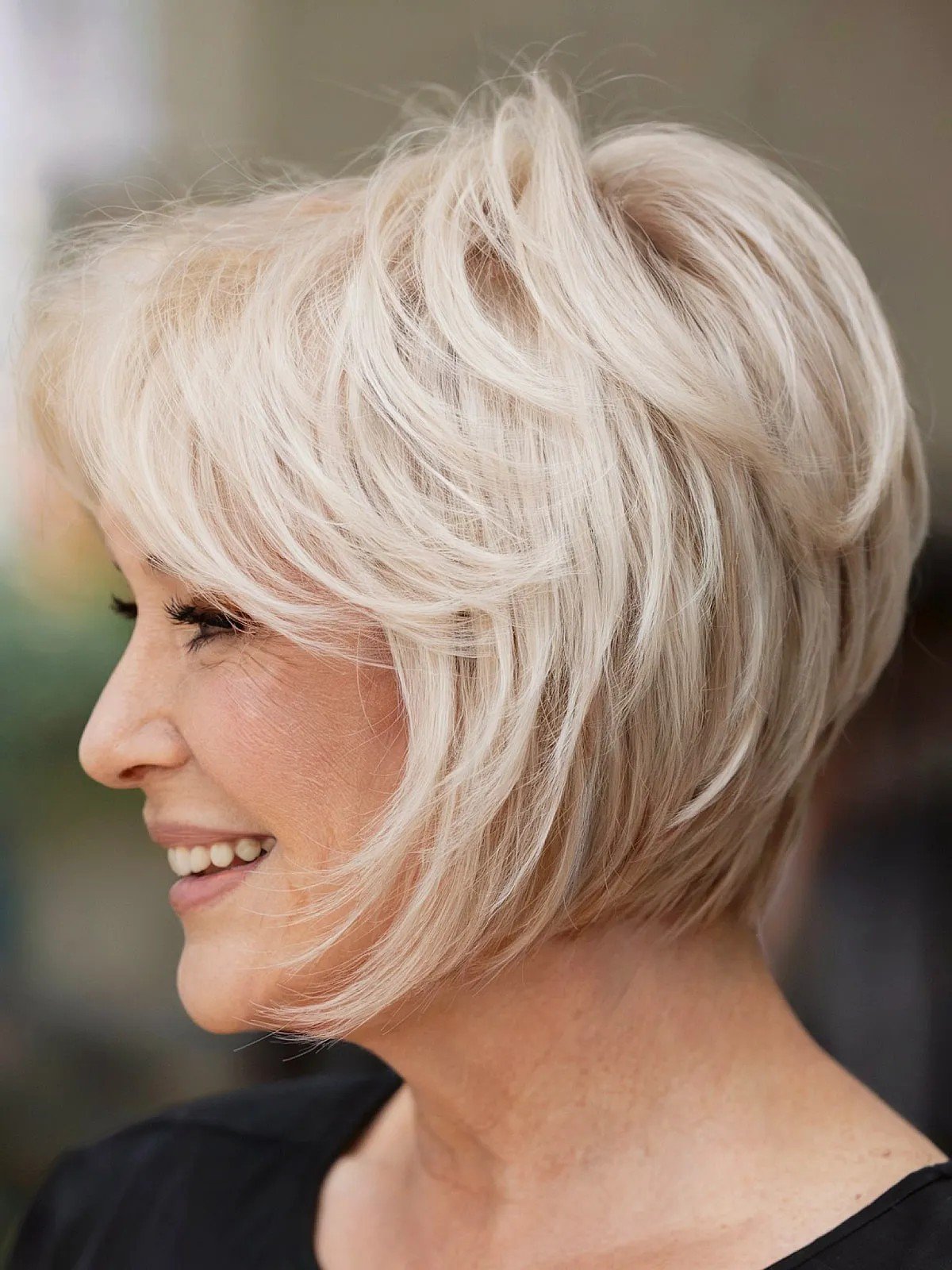 Classic feather bob with hidden layers for the older women last 60 with blond hair