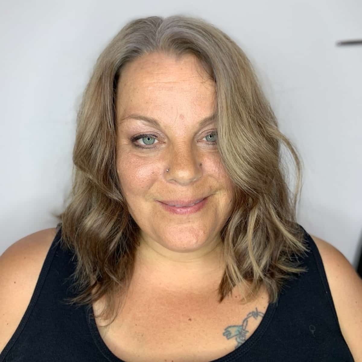 Long bob for more than 60 with a fat face shape