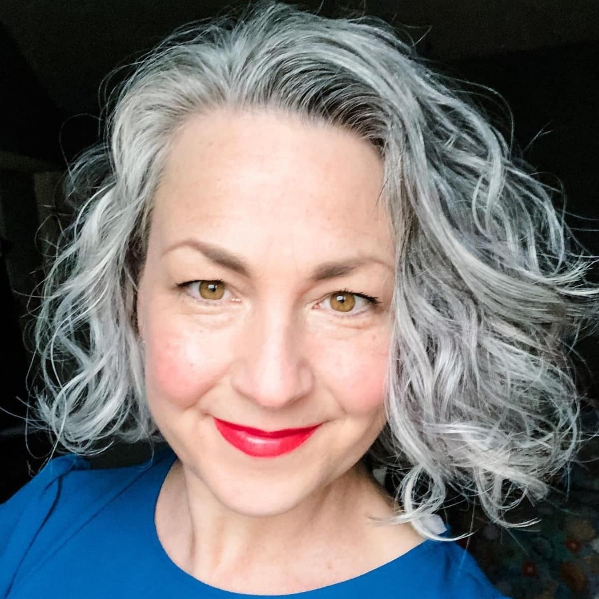 A medium silver hairstyle wavy
