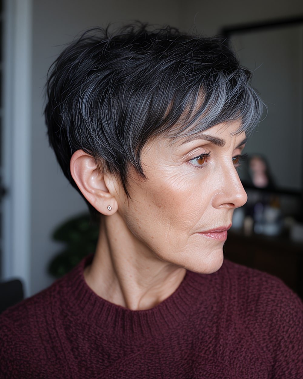 Steel-toned pixie cut with textured layers and grey blending for dark fine hair and a modern cropped finish