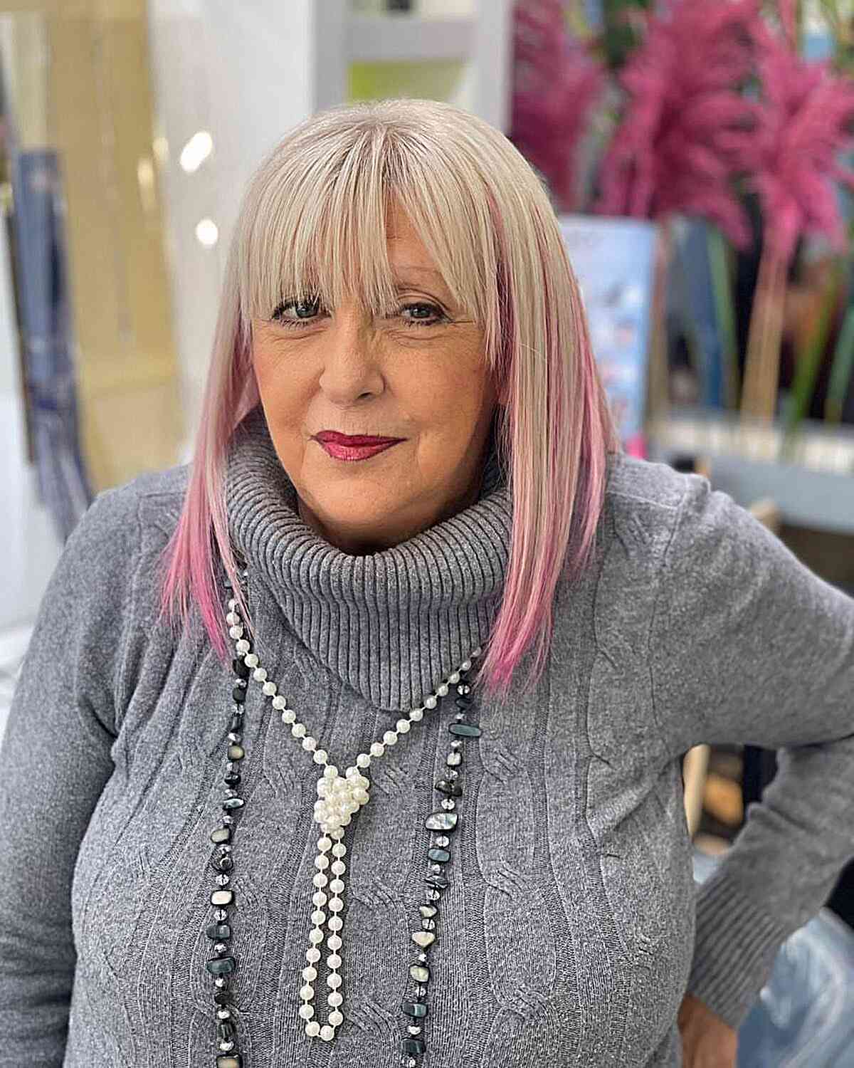 Wonderful long bob with a pink decline dye for women between 60 years old