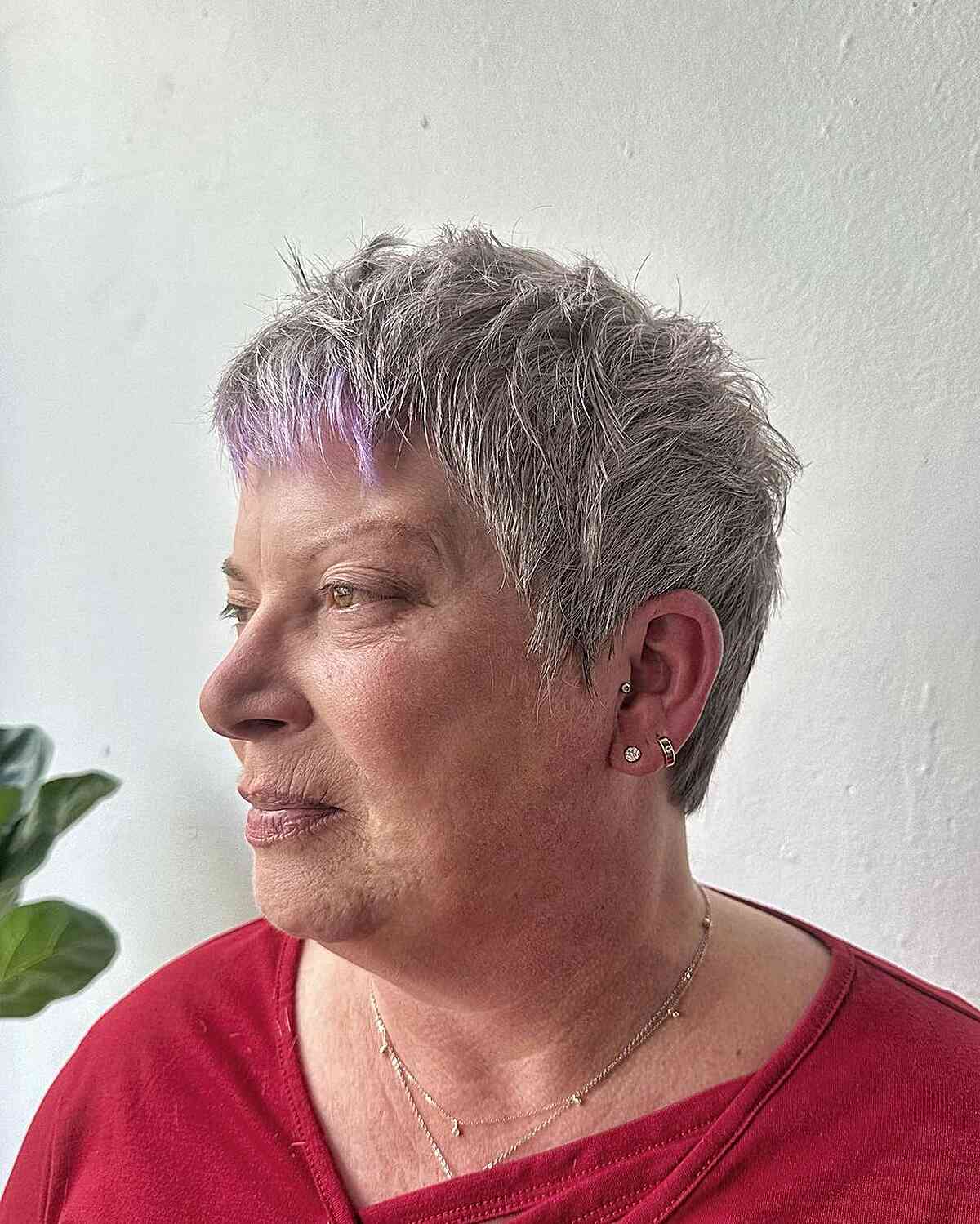 Very short gray hair with purple explosions for excess ladies over 60 years