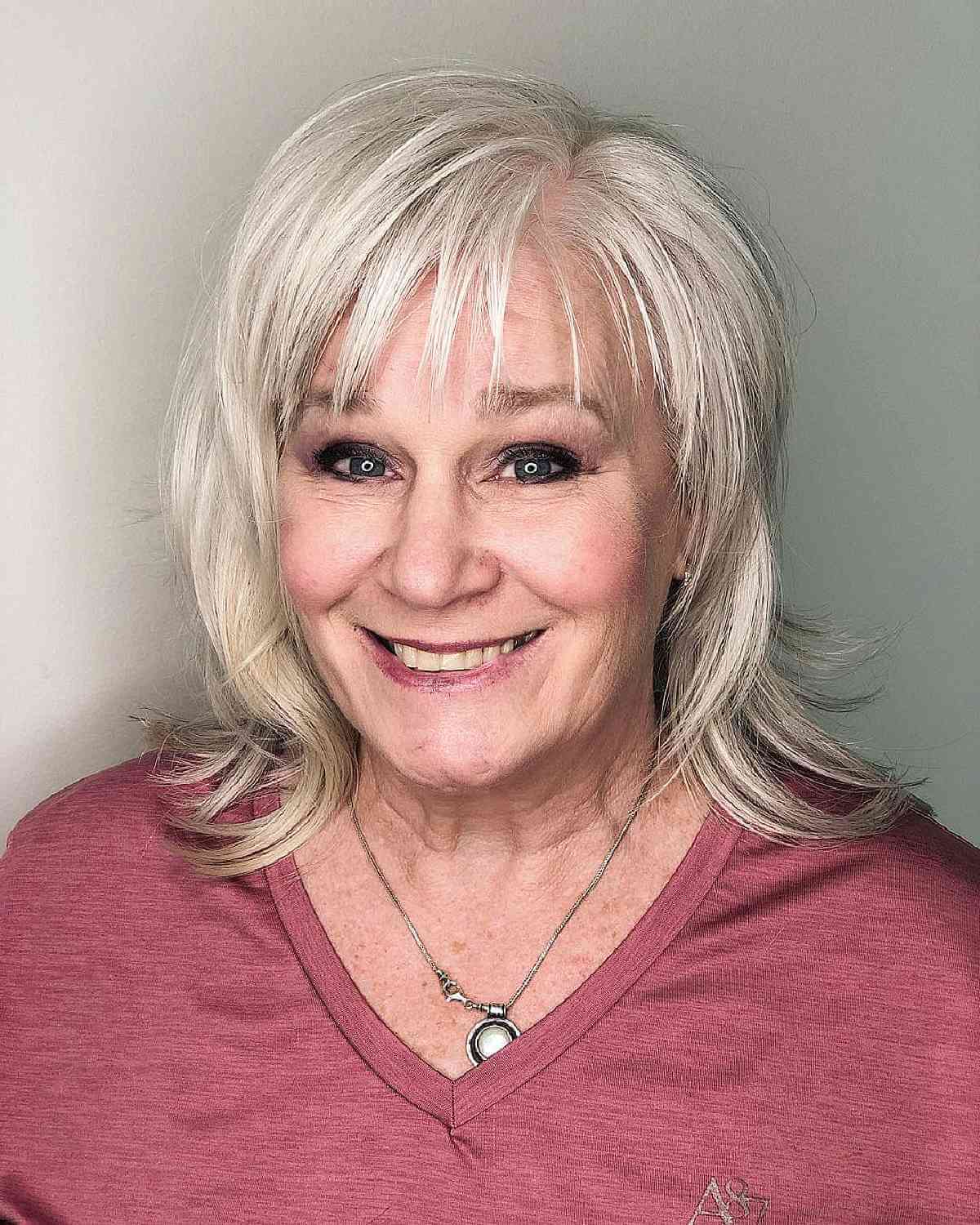 Bob Shag with the length of the shoulder with wide bangs