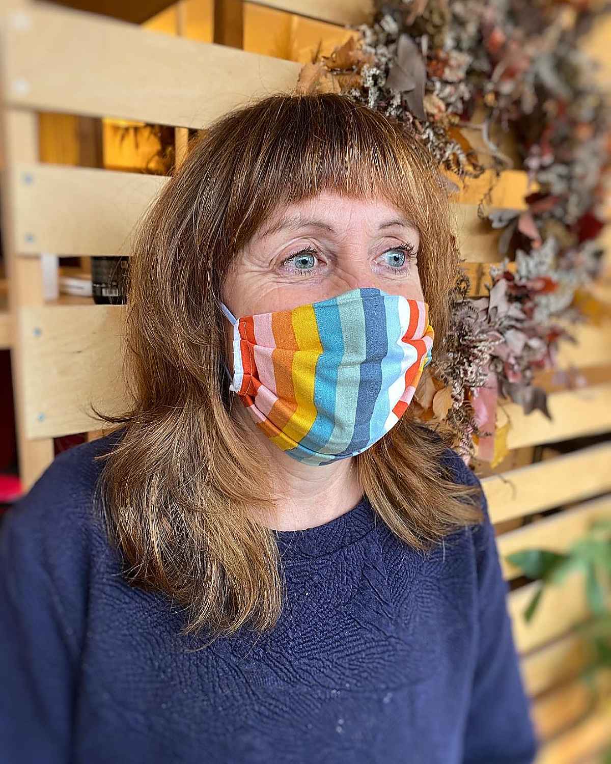 Feathers' fool with short bangs for women between 60 years old