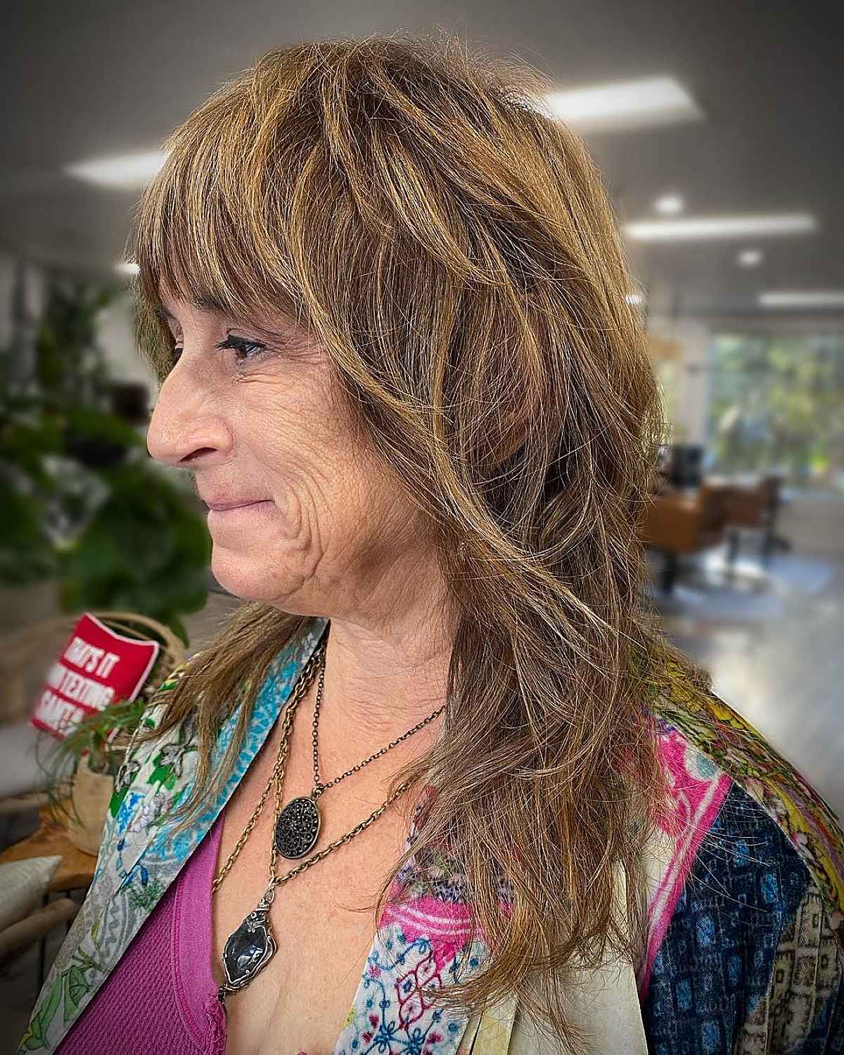 Medium length mullet with tight layers