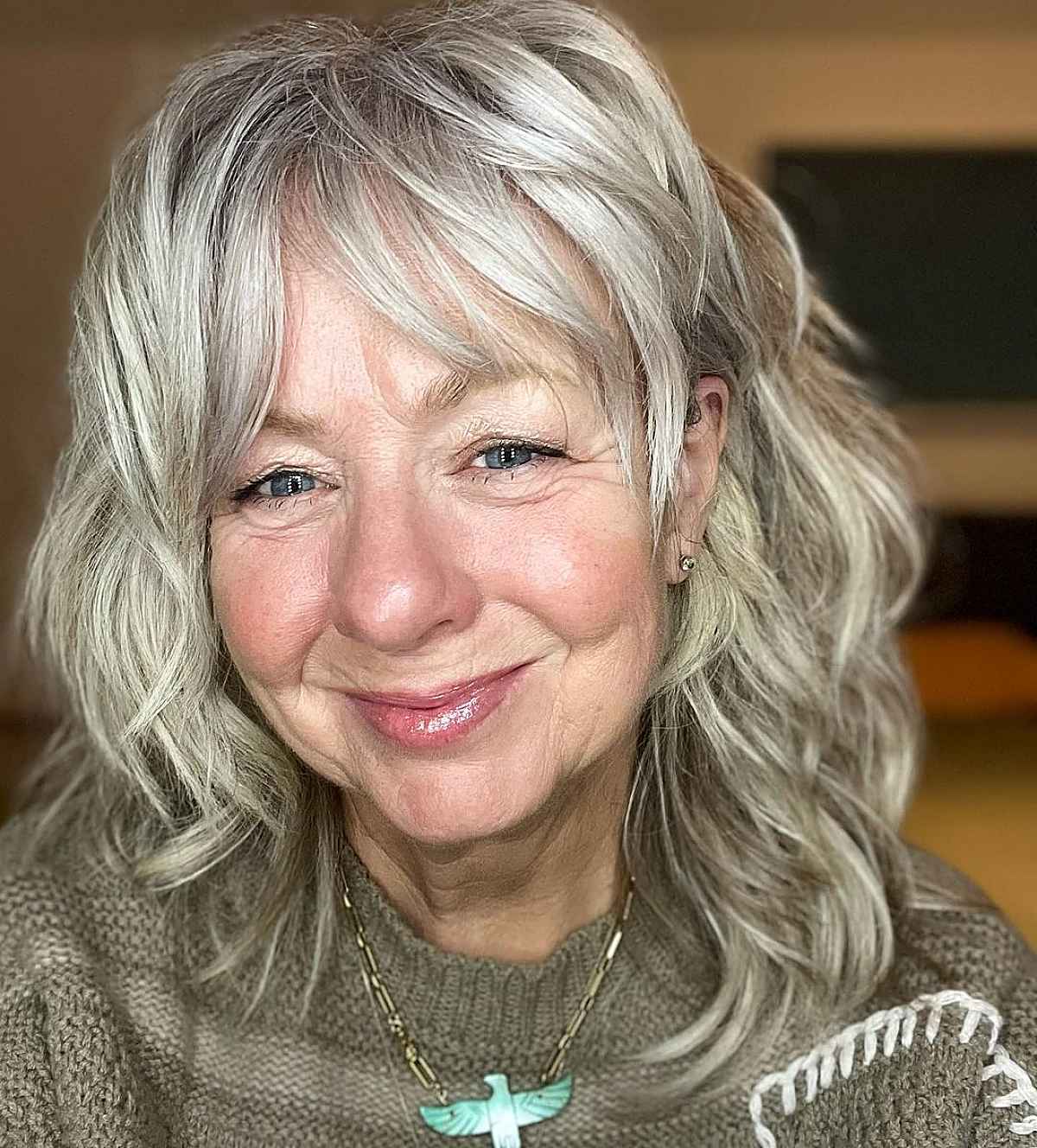 Puritus with a soft margin of wavy hair