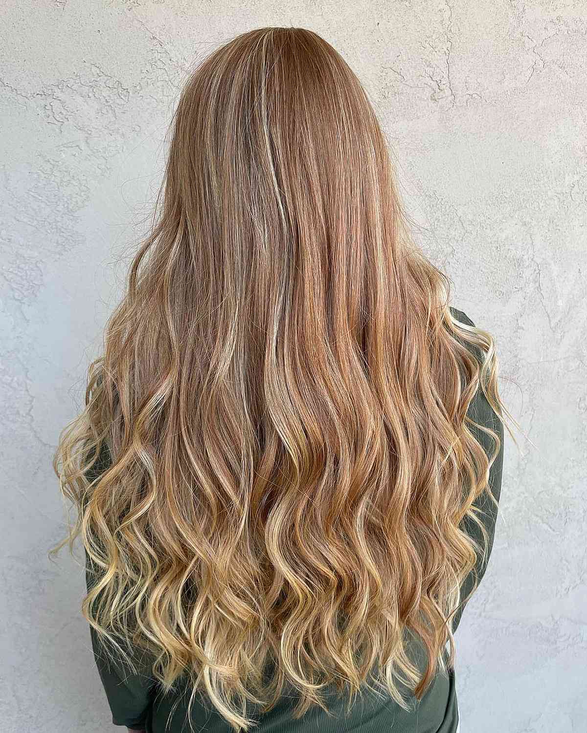 Natural strawberry blonde with sun -drenched highlights