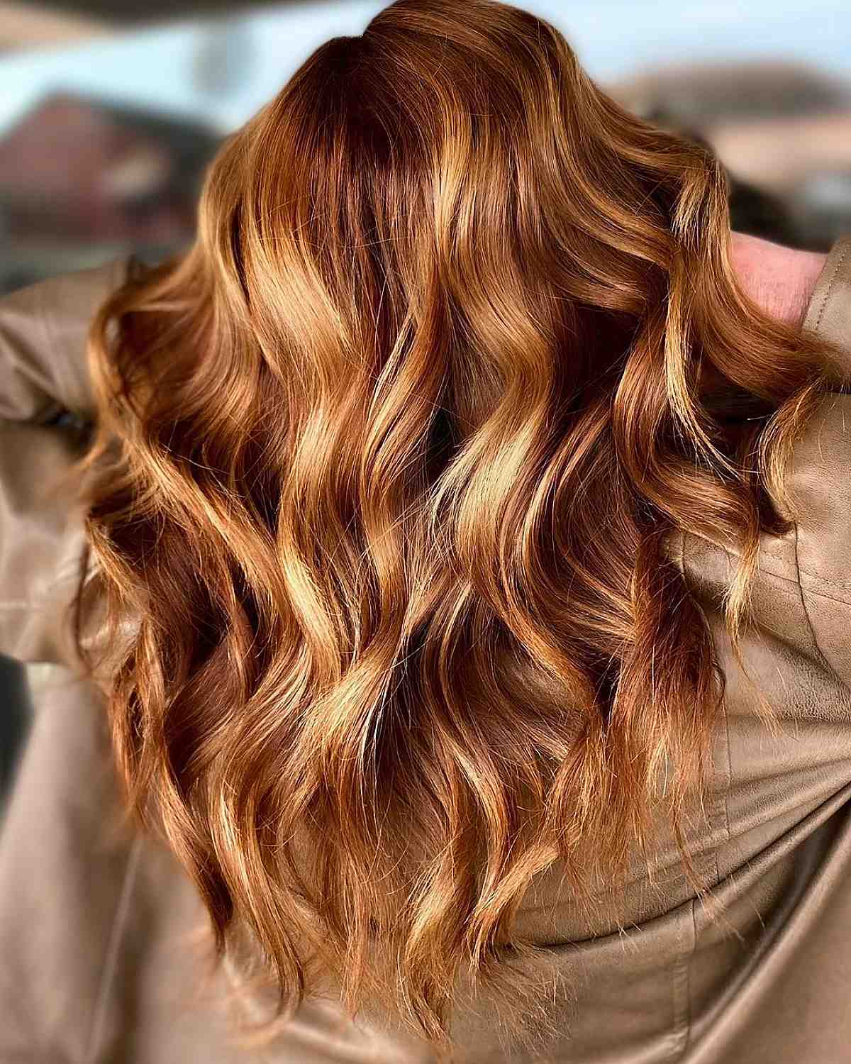 Golden caramel paint with long loose curls