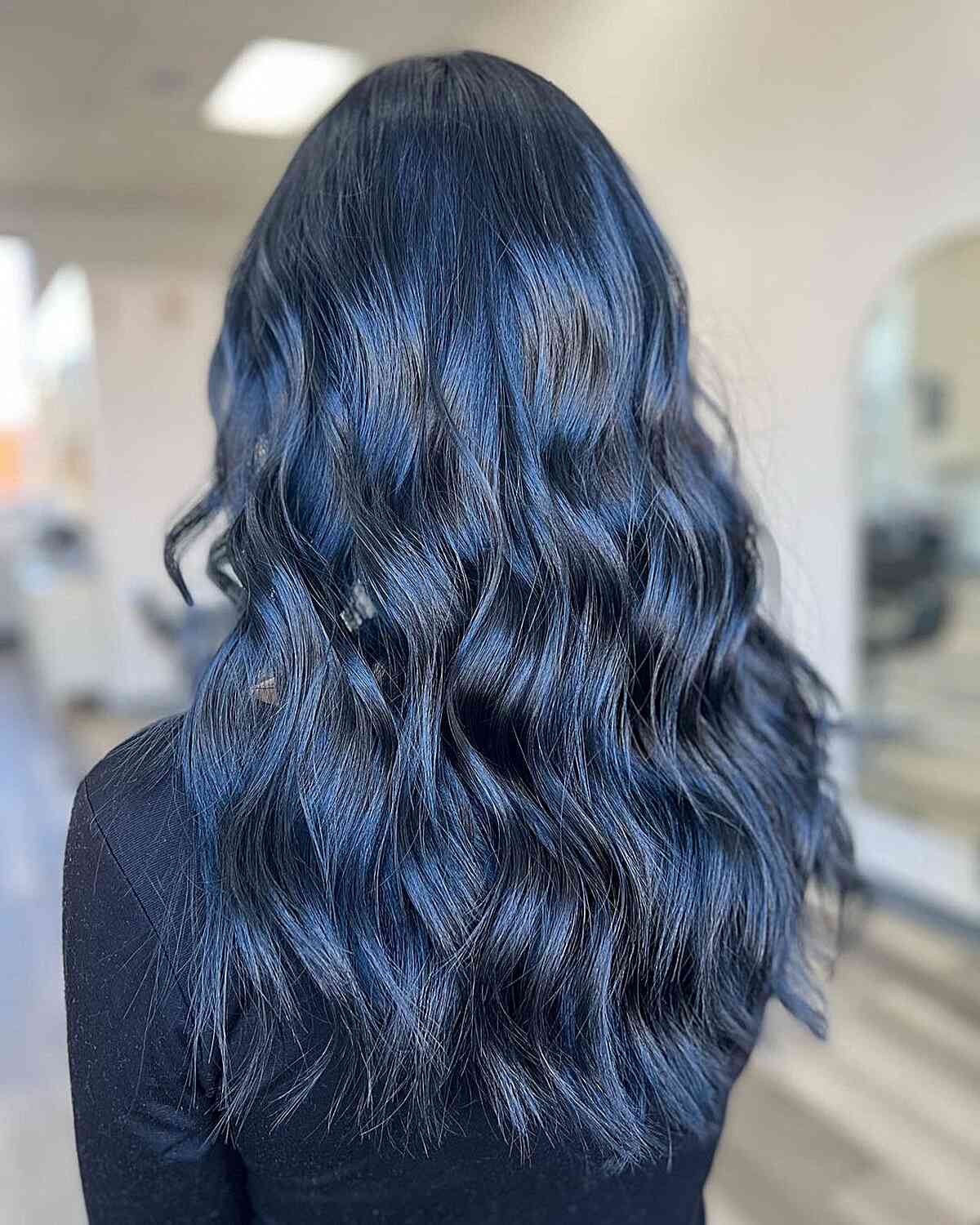 Deep midnight navy-blue hair color