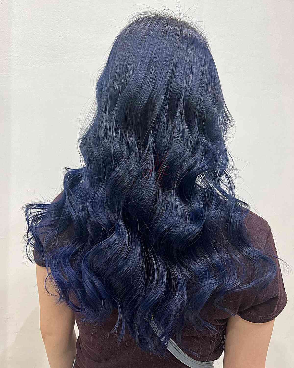 Deep midnight navy blue hair color