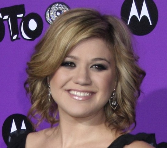 2014 short hairstyles for round faces: curly hair cutting for women