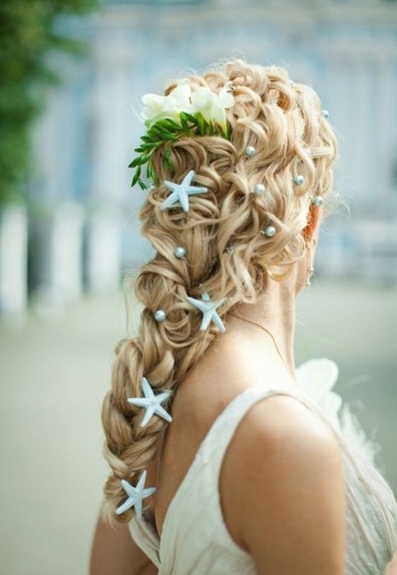 Beach topic - wedding braid with blue stars decorations and pearls