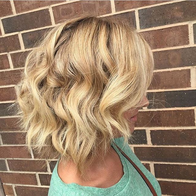 Successful blonde bob hairstyle with beach waves