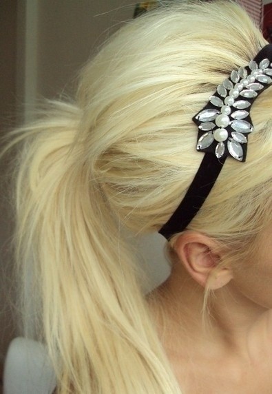Blonde, horse -tail hair styles with a head band