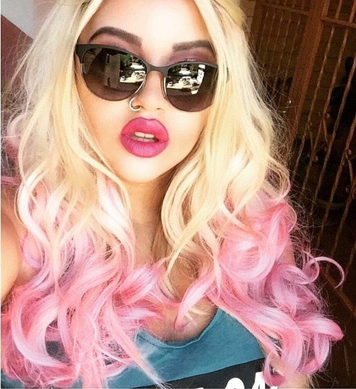 Blond and pink hairstyle with a central part