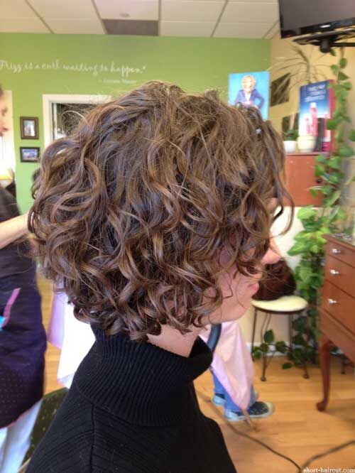 Brown, short curly hairstyle