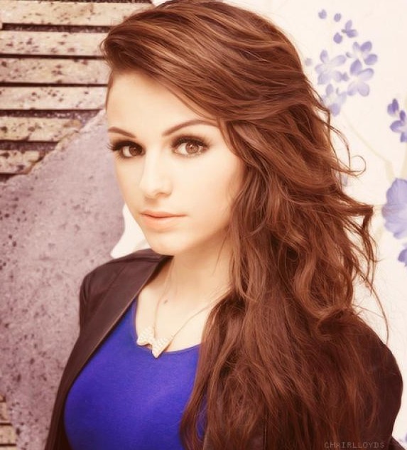 Sher Lloyd's hair: brown hair is a long curly