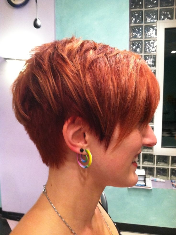 Elegant haircut for women: short red hair