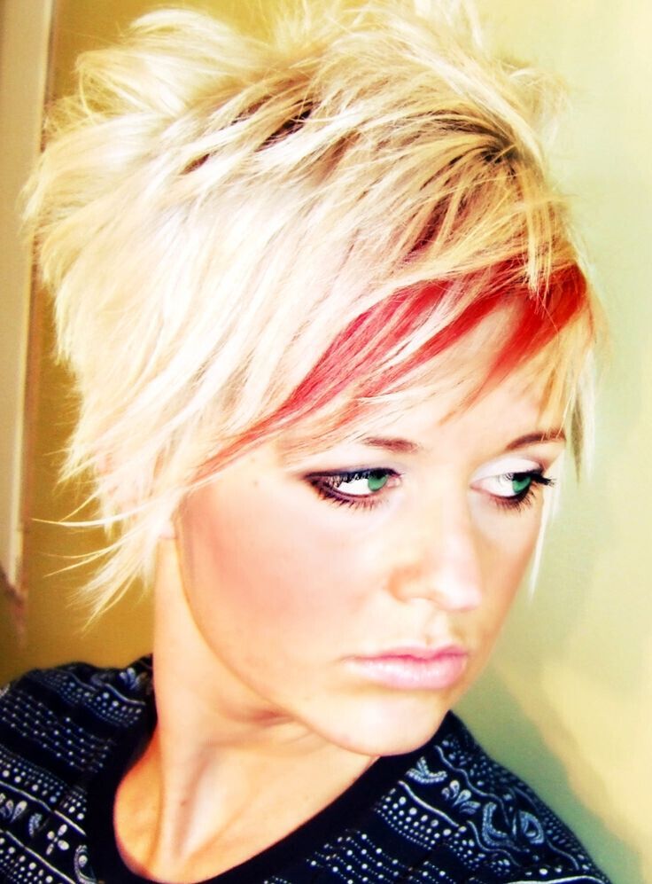 Crazy rail 'pieces. Blonde platinum with red highlighting the explosion for fun. Wash to sweet pink!