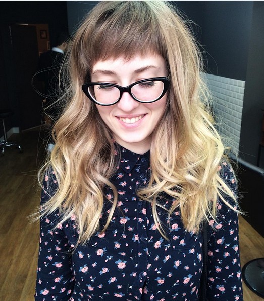 The curly curly hairstyle with sharp bangs - blonde.