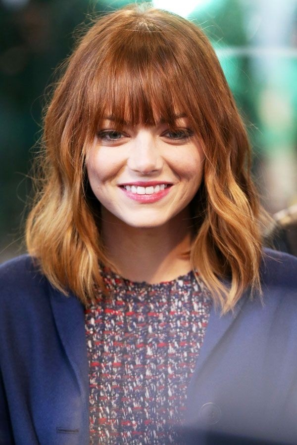 Emma Stone moderate hairstyle with sharp bangs - medium haircuts ideas
