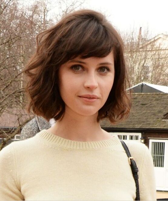 Pope's official cut with side bangs