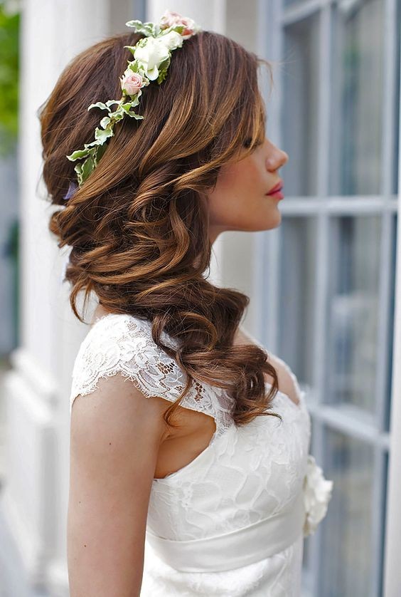 Wonderful wedding hairstyle with a flower